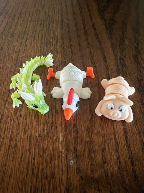 Bring Joy to Your Day with Small Articulated Animals and Creatures! Add a touch of whimsy to your world with our fun and friendly collection of 3D-printed animals and creatures. From playful dragons and charming farm animals to fascinating sea creatures and beyond, there's something for everyone to enjoy. Each figure is carefully printed for maximum movement and personality. New designs are always in the works, so check back often to see what magical friends have joined the collection!